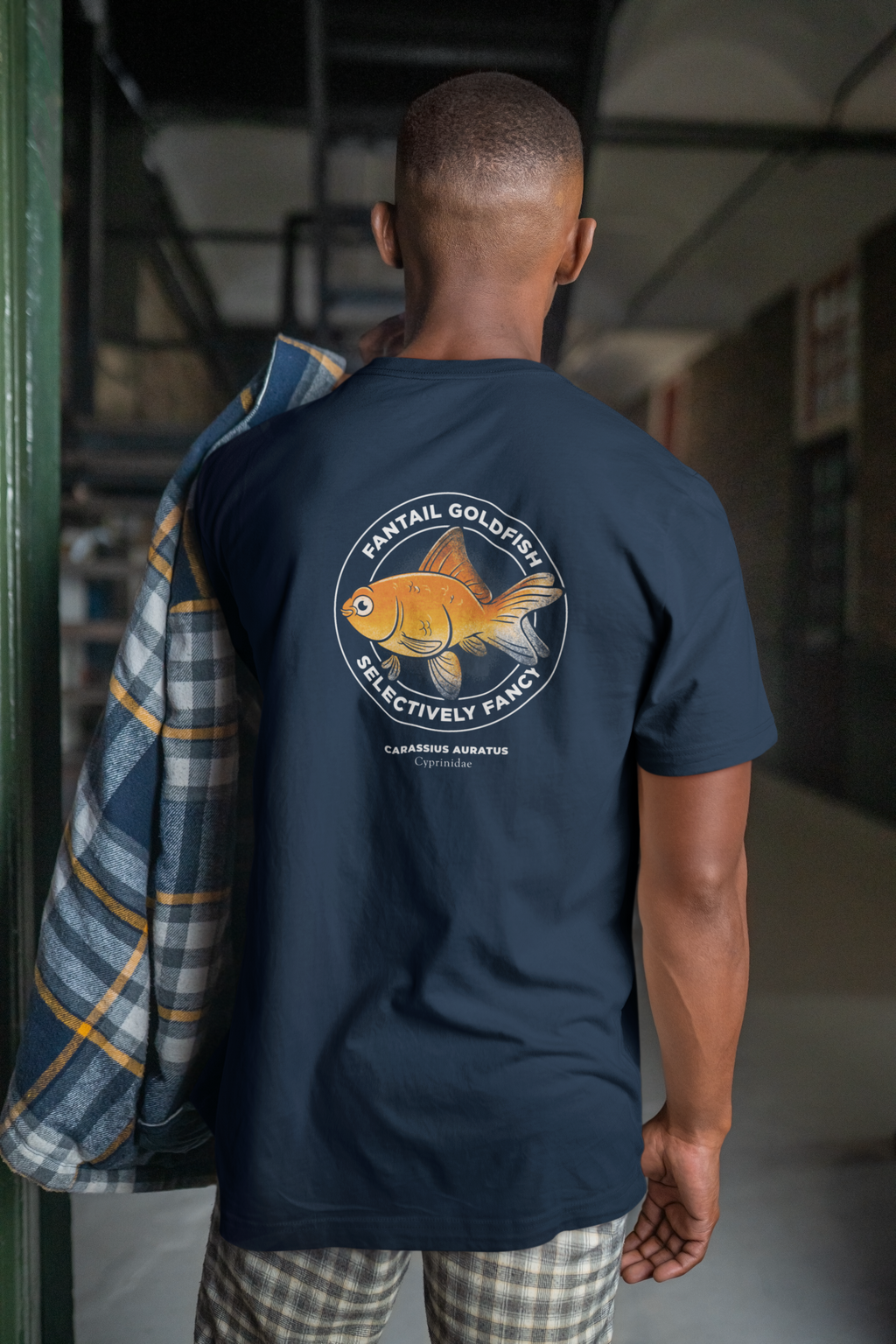 Guy wearing faintail goldfish print t shirt